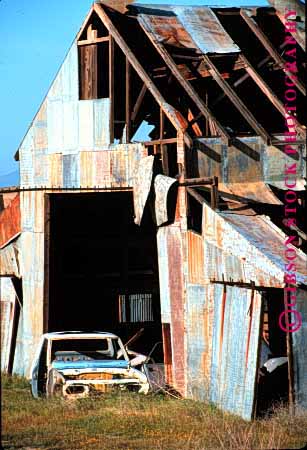 Stock Photo #1719: keywords -  abandon apart barn building car collapse crumble deteriate discard falling loss old property ruin rundown vert waste