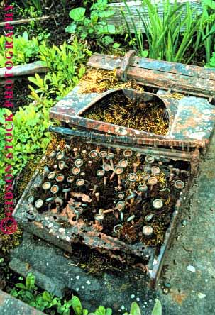 Stock Photo #1720: keywords -  abandon apart collapse crumble deteriate discard falling loss old property ruin rundown rust typewriter vert waste