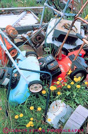 Stock Photo #16400: keywords - abandon abandoned aged aging building buildings collapse collapsed collapses collapsing crumble crumbles crumbling decay decayed decaying decays desert deserted deteriate deteriated deteriates deteriating empty engine engines equipment forgotten forlorn junk landscape lawn mower mowers old older oldest pile power vert