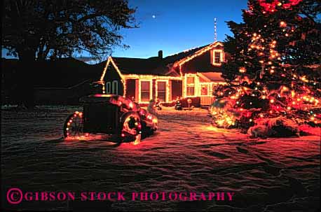 Stock Photo #1724: keywords -  christmas decoration dusk evening holiday home horz house lighting property released snow sunset tree winter