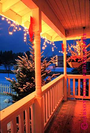 Stock Photo #1729: keywords -  christmas decoration dusk evening holiday home lighting model porch released snow vert winter