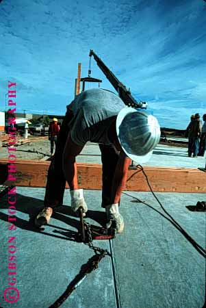Stock Photo #1741: keywords -  building construction crane danger hardhat industry job men risk tilt up vert work