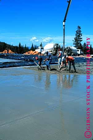Stock Photo #1745: keywords - building commercial concrete construction finish floor industry men pour skill smooth team vert work