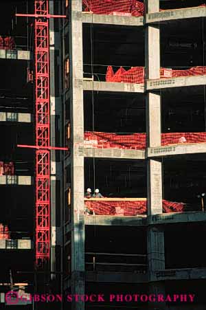 Stock Photo #6105: keywords -  build building career construction frame hardhat high income job men new occupation office rise steel two vert vocation work workers