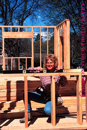 Stock Photo #1750: keywords -  carpenter construction craft eye female frame home house income job level model new occupation protection released safety skill vert woman wood work