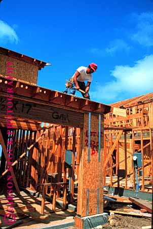 Stock Photo #1752: keywords - build carpenter construction craft ethnic frame hammer hispanic home job labor man model new occupation released skill vert wood work