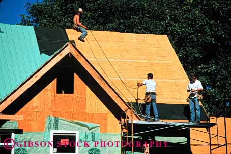 Stock Photo #1754: keywords -  construction finish home horz house job labor lay men new occupation plywood roof roofing team work
