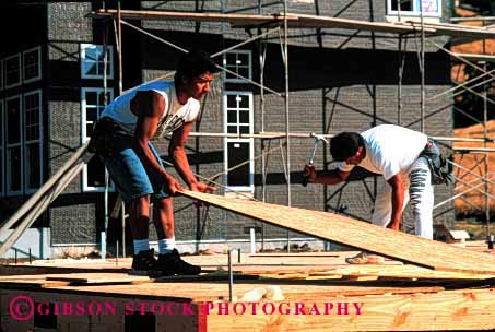 Stock Photo #1756: keywords -  build carpenters construction ethnic hispanic home horz job labor men new occupation plywood skill