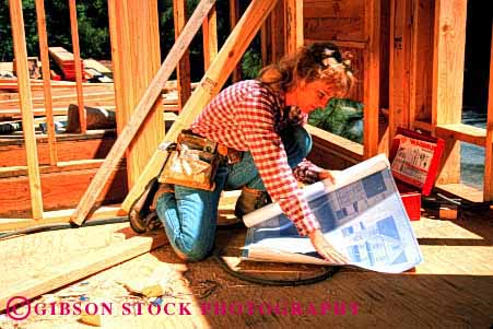 Stock Photo #1757: keywords -  blue building carpenter construction female frame home horz house job labor model new occupation plans print read released review sight skill vision woman wood