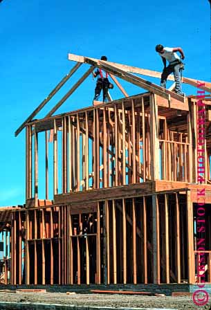 Stock Photo #1763: keywords -  build carpenter construction craft danger fall frame geometric geometry home house industry job men new rafter risk skill square trade vert wall wood work