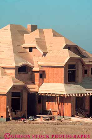 Stock Photo #13805: keywords -  board boards build building construction frame frames framing home homes house houses lumber new residence residential vert wood wooden