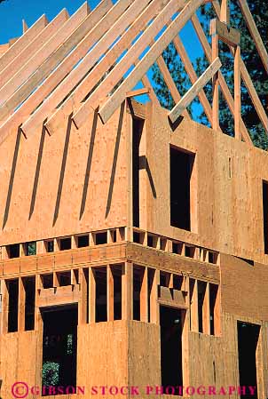 Stock Photo #13810: keywords -  board boards build building construction eve frame frames framing home homes house houses lumber new plywood rafter rafters residence residential roof roofs shape shaped siding slope slopes sloping triangle triangles triangular vert wood wooden