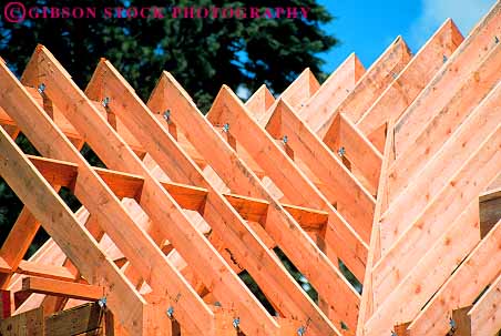 Stock Photo #13813: keywords -  angle angles board boards build building construction frame frames framing geometric geometrical geometry home homes horz house houses linear lumber new pattern patterns peak rafter rafters repeat repeating repeats repetition residence residential roof roofs row rows triangle triangles wood wooden