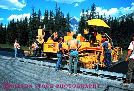 Stock Photo #1770: keywords -  asphalt construction cooperate crew equipment highway horz interstate job machine maintenance men pavement paving road safety street team work yellow