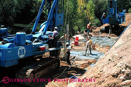 Stock Photo #1771: keywords -  abutment bridge construction crew drill highway horz installation road