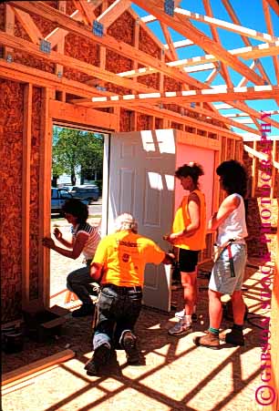 Stock Photo #1774: keywords -  build charity construction cooperate for frame give habitat help home house humanity men new oconto team vert volunteers wisconsin women wood