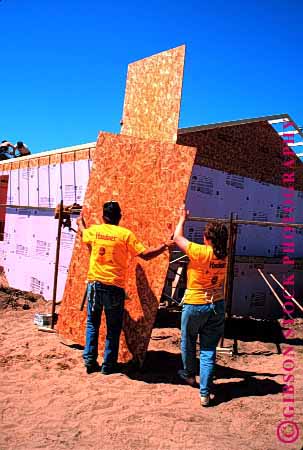 Stock Photo #1775: keywords -  board build charity chip construction cooperate for frame give habitat help home house humanity men new oconto team vert volunteers wisconsin women wood