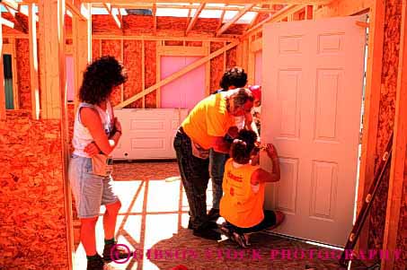 Stock Photo #1776: keywords -  build charity construction cooperate for frame give habitat help home horz house humanity men new oconto team volunteers wisconsin women wood