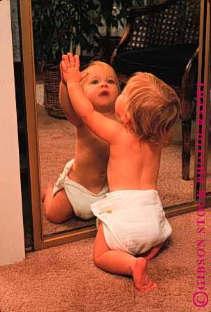 Stock Photo #1789: keywords - baby child crawl cute diaper infant mirror model play reach reflect released vert