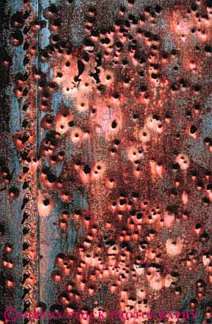 Stock Photo #3436: keywords -  abstract bullit holes iron metal old oxidation oxidize oxidized red reddish rust rusted rusty stain stained stains vert weathered