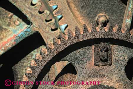 Stock Photo #1805: keywords -  blemish chemical circle destroy deteriate dissolve gear horz iron metal old oxidation oxidize oxidized reaction red reddish round rust rusted rusty stain stained stains teeth wheel