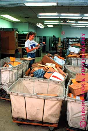 Stock Photo #1807: keywords - career carrier communicate deliver employee income industry job jobs letter letters mail occupation office organize organizes organizing package parcel people person post postal released service shipping sort sorter sorting sorts stamp vert woman work worker