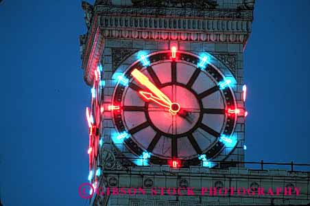 Stock Photo #1814: keywords -  circle clock colorful dial hands horz modern neon rotate round time tower