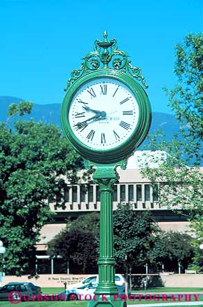 Stock Photo #12531: keywords - circle circular clock clocks colorado display displaying displays hand hands hour hours indicate indicating indication indicator minute minutes number numbers numeral numerals plaza rotate rotates rotating rotation round show showing shows springs time vert