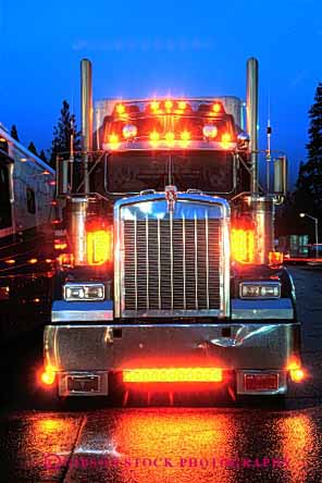 Stock Photo #1821: keywords -  bright commerce industry lights night park rain shipping transportation truck trucking vert wet