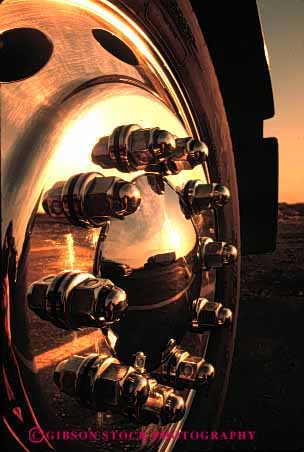 Stock Photo #1824: keywords - chrome circle clean commerce equipment industry machine reflect roll rotate round shiny shipping sunrise sunset transportation truck trucking vert wheel