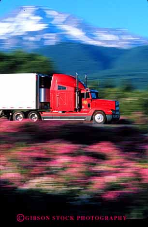 Stock Photo #1832: keywords -  blur commerce dynamic industry motion moving red shipping transportation truck trucking vert