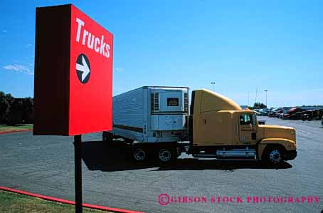 Stock Photo #1838: keywords -  arrow commerce direct directing direction directs horz industry park shipping sign signs stop transportation truck trucking trucks