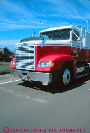 Stock Photo #11282: keywords -  blur blurred california equipment front heavy interstate motion move movement moving red road roads roll rolling rolls streets transportation truck trucking trucks vert