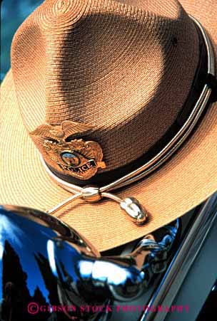 Stock Photo #1842: keywords - brim broad clothes gold handsome hat policeman symbol vert