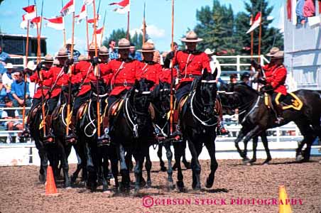 Stock Photo #1845: keywords - cana display horse horz perform red ride show troop uniform