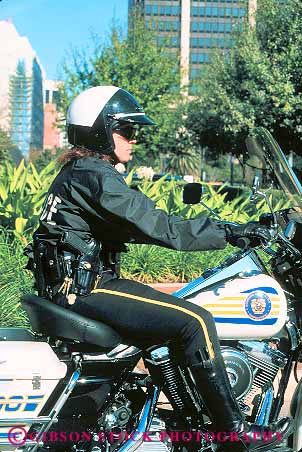 Stock Photo #16624: keywords -  authority career drive drives driving employee employees enforced enforcement enforces enforcing female force helmet job jobs law local motorcycle motorcycles municipal occupation occupations officer officers official patrol patrolling patrolman patrols people person policeman policemen policewoman public safe safety security servant service uniform uniforms vehicle vert vocation woman work worker workers working works