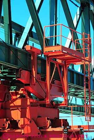 Stock Photo #6099: keywords -  brace bracing bridge build building built clean construction crane equipment frame gantry green heavy hoist industry lift lifting metal new orange paint vert