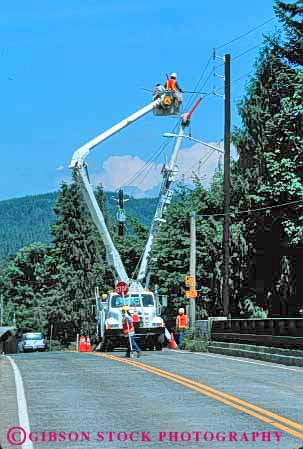 Stock Photo #6176: keywords -  career electrical electricity elevate equipment grid heavy hydraulic industry lift occupation power repair risk shock truck up utility vert vocation wire wires work workers working