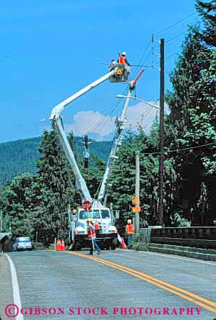 Stock Photo #6176: keywords - career electrical electricity elevate equipment grid heavy hydraulic industry lift occupation power repair risk shock truck up utility vert vocation wire wires work workers working