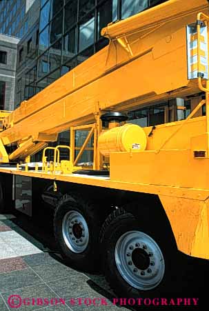 Stock Photo #6178: keywords -  clean crane equipment heavy industry lift machine mobile movable new portable shiny strong truck vert yellow