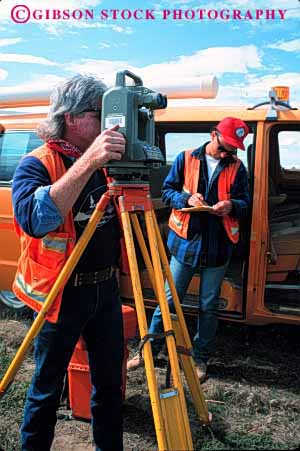 Stock Photo #1858: keywords -  adjust adjusting adjustments adjusts assess career caution color crew crews distance equipemtn exact field in job jobs level look looking looks man measure men model near occupation orange outdoor people person precise record released safety scope scopes see seeing sees sight surveying surveyor surveyors surveys team teams tool tools tripod tripods truck two use uses using vert vest vests vision work worker workers working works