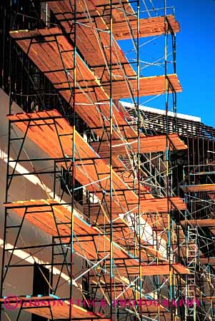 Stock Photo #1860: keywords -  boards climb construction danger equipment fall geometric geometry platform risk scaffold support vert wood