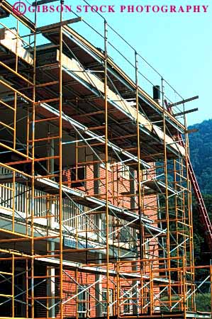 Stock Photo #1861: keywords - boards climb construction danger equipment fall geometric geometry platform risk scaffold support vert wood
