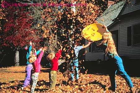 Stock Photo #3344: keywords - autumn catch catches catching child children ethnic fall friend friends fun game group groups home horz in kid kids leaf leave leaves mother outdoor outdoors outside play playing plays reach reaches reaching released scatter scattering scatters season throw throwing throws up upward upwards with youth