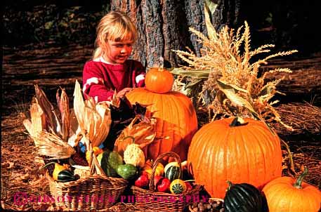 Stock Photo #1887: keywords -  autumn child fall girl harvest horz model play produce pumpkin released squash vegetable