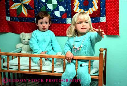 Stock Photo #1890: keywords -  bedroom boy changing children cute girl horz model pair play pose released sleeper table together