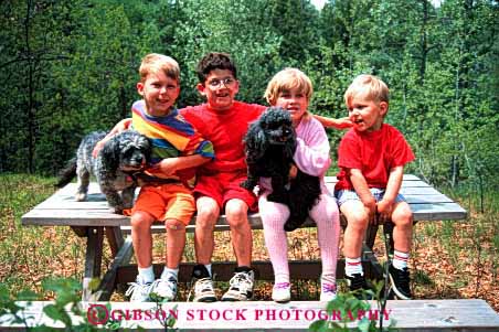 Stock Photo #1894: keywords -  boys children cute dog girl group horz model outdoor picnic play pose released sit together
