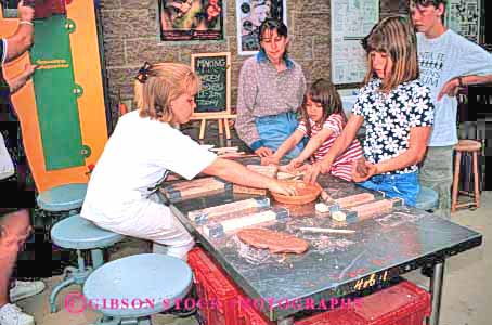 Stock Photo #1897: keywords -  art artistic arts child children childrens clay craft crafts creative education fe girl girls group hands horz kid kids mexico molding museum museums new project projects sante skill youth