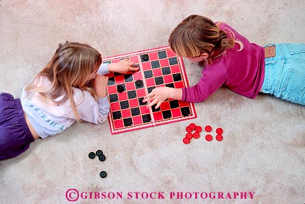 Stock Photo #16700: keywords -  carpet checker checkers child children contest contests floor floors game games girl girls home horz house indoor indoors inside kid kids people person playing skill skills young youth