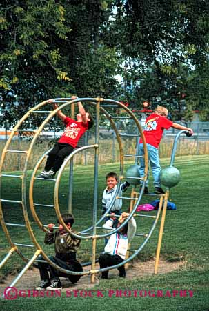 Stock Photo #1899: keywords - boys children climb exercise hang physical play playground social together vert